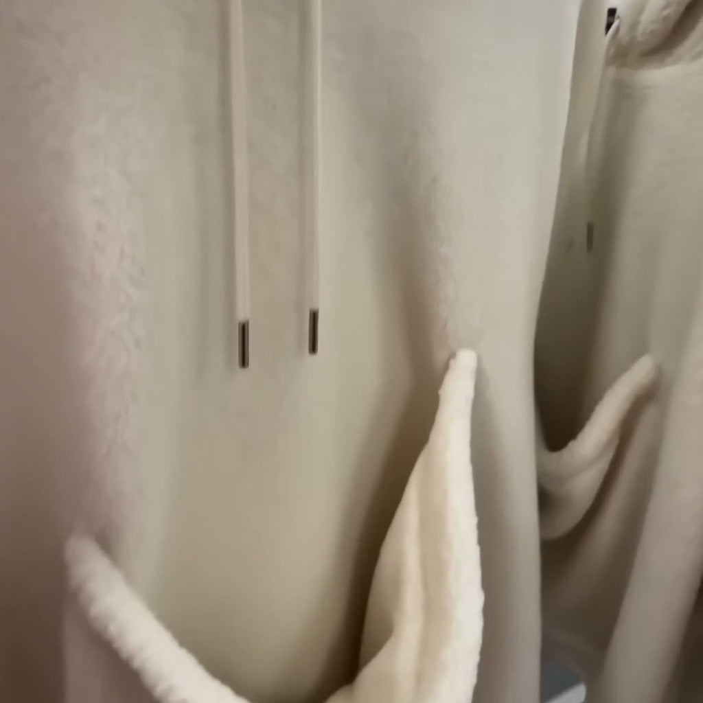 Close-up of the sherpa pouch lining and drawcords